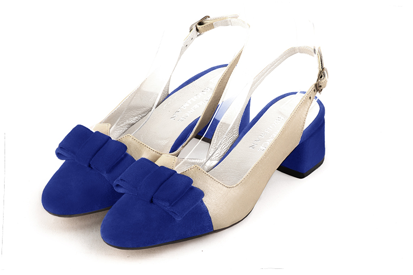 Electric blue and gold women's open back shoes, with a knot. Round toe. Low flare heels. Front view - Florence KOOIJMAN